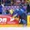 COLOGNE, GERMANY - MAY 20: Sweden's Alexander Edler #24 is taken out along the boards by Finland's Atte Ohtamaa #55 during semifinal round action at the 2017 IIHF Ice Hockey World Championship. (Photo by Andre Ringuette/HHOF-IIHF Images)

